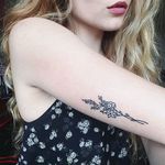 Nikki's bouquet tattoo by Cate Webb. #handpoke #bouquet #flower #linework #catewebb