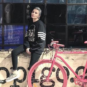 Tattoo Artis Eva Galipdede looking fly AF with an all pink bike. (via IG—evakrbdk) #microtattoo #microscenery #circlescene #tinytattoo