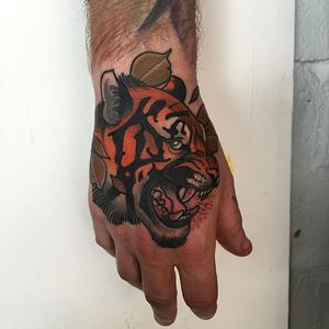 Tiger Hand Tattoo by Mitchell Allenden #tiger #tigertattoo #neotraditionaltiger #hand #handtattoo #handtattoos #neotraditionalhandtattoo #neotraditional #neotraditionaltattoo #neotraditionaltattoos #MitchellAllenden