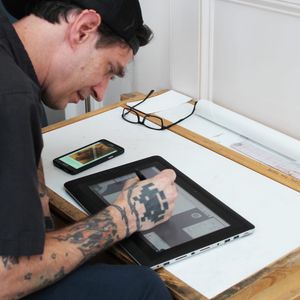 Anonymous Tattoo's resident artist Clay McCay working diligently on a Cintiq tablet. (Photo by kd diamond) #ClayMcCay #AnonymousTattoo #SavannahGeorgia #Georgia #WeirdTraditional