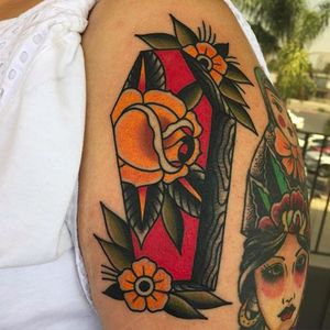 Yellow rose and coffin traditional tattoo by @jacobdoneytattoo #jacobdoneytattoo #traditional #traditionaltattoo #envisiontattoostudio #rose #coffin