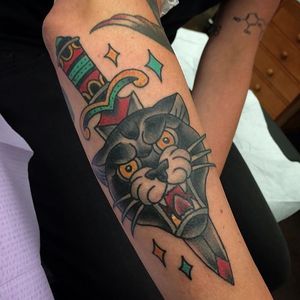 Stabbing  dagger tattoo by Chelsea Jane #ChelseaJane #daggerthroughtattoo #stabbingdaggertattoo #panther #cat