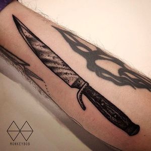Knife tattoo, check out the texture on this tattoo by Monkey Bob. #MonkeyBob #black #tattoo