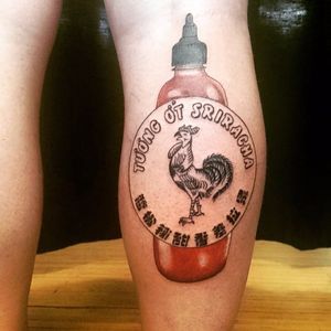 A combination of blackwork and color to break up the red sriracha bottle. Tattoo by Justin Yates. #sriracha #blackwork #JustinYates #linework #neotraditional