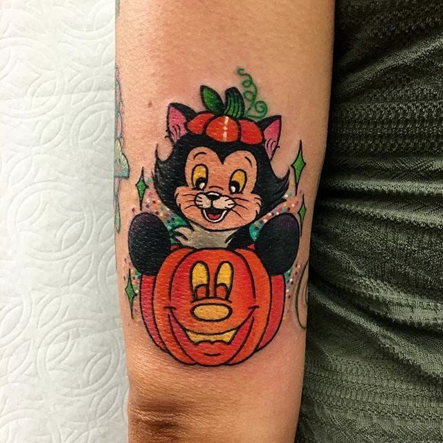 Premium Vector  Tattoo design hand drawn pumpkin with skull halloween  illustration