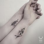 Matching floral tattoos by Zihwa #zihwa #smalltattoos #blackandgrey #illustrative #leaves #moon #flowers #matchingtattoo #floral #coupletattoo #tattoooftheday