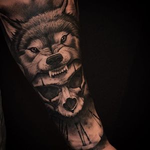 Intense wolf and skull tattoo by Ben Thomas. #realism #blackandgrey #blackandgreyrealism #portrait #BenThomas #wolf #skull