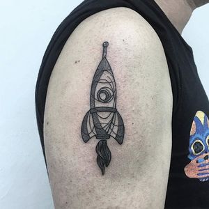 Rocket tattoo by s.leeray on Instagram. #rocketship #space #linework #btattooing #blackwork #blckwrk