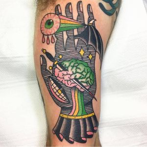 Psychedelic tattoo by Teide #Teide #surrealisttattoo #color #strange #linework #eyeball #brain #batwing #sword #hand #mouth #goldtooth #stars