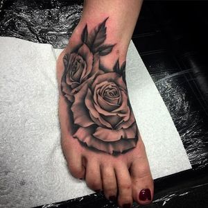 Roses on the foot tattoo by Bobby Loveridge @bobbalicious_tattoo #black #blackandgray #churchyardtattoostudio #uk #roses