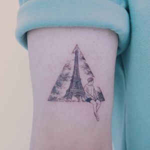 Eiffel Tower tattoo by Baam Kr #BaamKR #architecturetattoos #fineline #linework #illustrative #realistic #realism #small #portrait #person #EiffelTower #Paris #France #building #trees #tattoooftheday