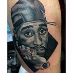 Tupac Shakur tattoo by Kevin LaRoy. #2pac #TupacShakur #rapper #portrait #blackandgrey