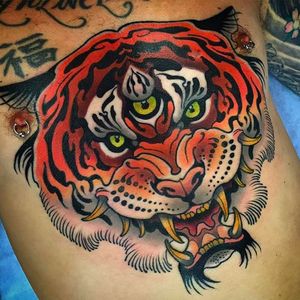 Brutal and fierce looking tiger head front piece by Sam Clark. #samclark #tiger #neotraditional