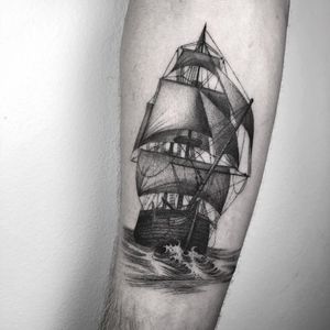 Ship at sea tattoo by Nathan Kostechko #NathanKostechko #sailortattoos #blackandgrey #illustrative #ocean #ship #boat #waves #sails #sea #detailed #linework #waves #seascape