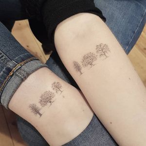 Matching tattoos by Sarah March aka die monde #SarahMarch #Diemonde #matchingtattoos #blackwork #dotwork #stickandpoke #handpoke #nonelectrictattoo #trees #nature #landscape #minimalist #small #tattoooftheday