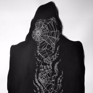 A reaper's silhouette filled with spiderwebs by Zac Scheinbaum. Photo by Katie Vidan. #artshow #fineart #Goodbye #KingAvenueTatoo #reaper #ZacScheinbaum