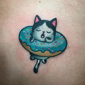 Donut tattoo by Christina Hock. #ChristinaHock #DolorosaTattooCo #donut #cat #kitten #kawaii #cute