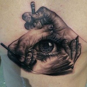 Surrealism hands drawing an eye tattoo by Tater Tatts. #realism #TaterTatts #surrealism #abstract #hands #drawing #eye