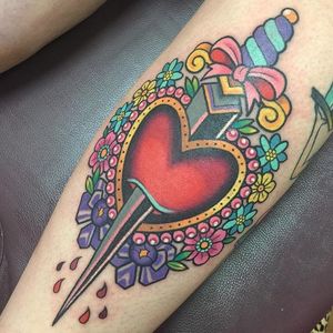 Traditional heart dagger tattoo by Sarah K. #SarahK #girly #traditional #dagger #flower #heart #heartdagger