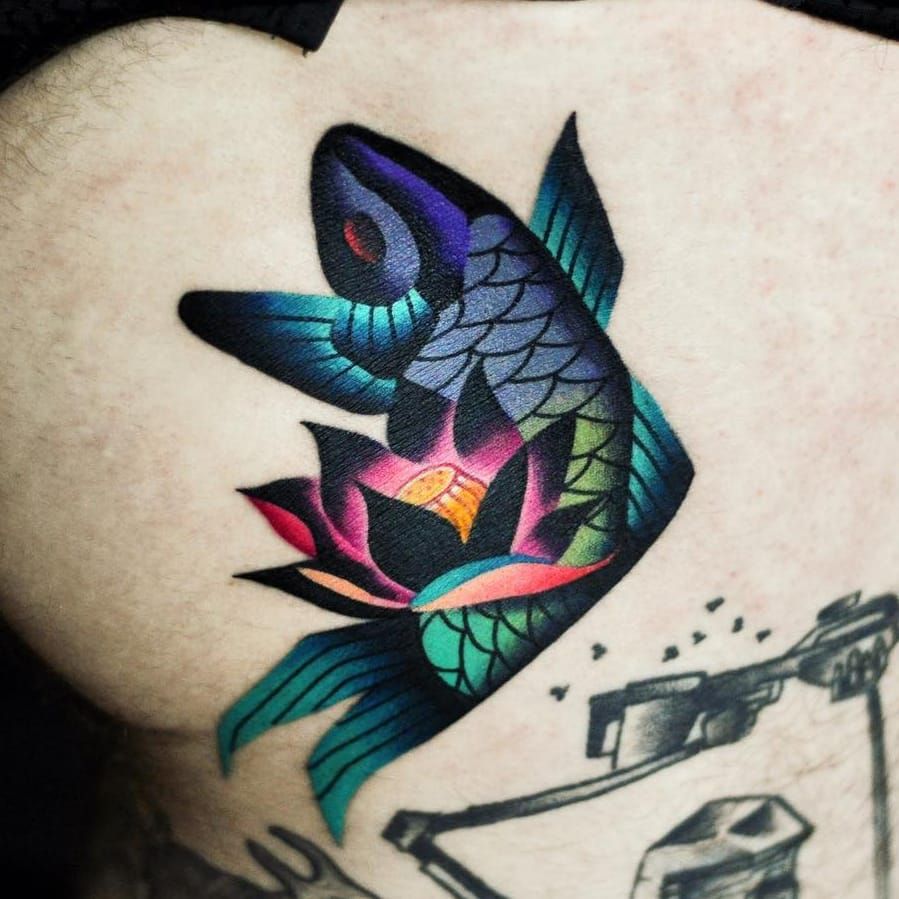 Tattoo uploaded by Tattoodo • Lotus fish tattoo by David Peyote  #DavidPeyote #naturetattoos #color #newtraditional #koi #fish #oceanlife  #ocean #lotus #flower #abstract #tattoooftheday • Tattoodo