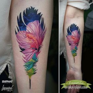 Hibiscus tattoo within a feather silhouette by Andrey Lukovnikov. #feather #silhouette #flower #hibiscus #AndreyLukovnikov