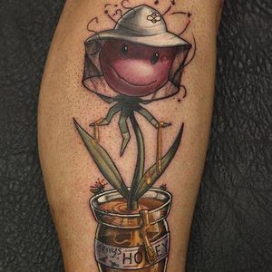 Plant Tattoo by John Anderton #PlantTattoo #PopCulture #PopCultureTattoo #PlantPotTattoo #JohnAnderton #honey #bee
