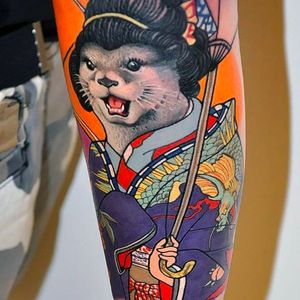 Super vibrant and solid tattoo of a cat wearing a geisha kimono. Incredible detail on this tattoo by Jaroslaw Baka. #jaroslawbaka #neojapanese #neooriental #coloredtattoo #cat #geisha #ryu #dragon #kimono