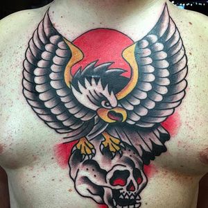 Bold and vibrant eagle on a skull. Chest tattoo by Aldo Rodriguez. #AldoRodriguez #GrandUnionTattoo #traditionaltattoo #boldtattoos #skull #eagle