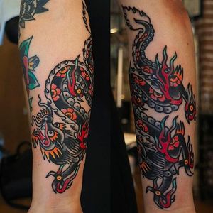 Amazing ang solid dragon forearm tattoo by Or Kantor. #OrKantor #dragon #traditional