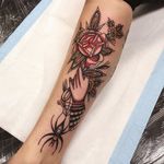 An exquisite disembodied hand with a rose and spider via Tommy Doom (IG—tommydoom). #hand #rose #spider #TommyDoom #traditional