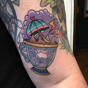 Storm in a tea cup tattoo by Alex Rowntree. #traditional #teacup #umbrella #storminateacup #AlexRowntree