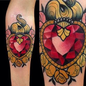 Elegant looking ruby heart tattoo done by Giulia Bongiovanni. #giuliabongiovanni #ruby #heart #neotraditional #coloredtattoo