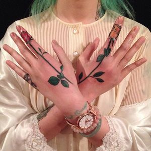 Finger rose tattoos by Nalla Smith. #NallaSmith #rose #longstemmedrose