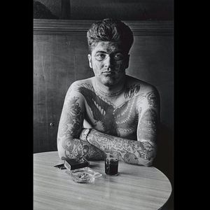 A young Jack Dracula chilling in a bar. Photo by Diane Arbus. #JackDracula #tattoohistory #theMarkedMan