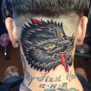 Traditional wolf tattoo by David Cassolino #nape #traditionalamerican #wolf