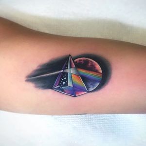 Pink Floyd tattoo by Jeremy Sloo Hamilton #JeremySlooHamilton #CoverUpTattoos #color #pinkfloyd #musictattoos #darksideofthemoon #pyramid #prism #rainbow #moon #space #stars #tattoooftheday