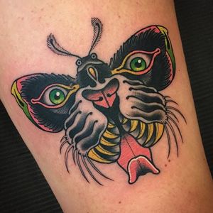 This tiger moth by Scott Garitson (IG—scottgaritsontattoo) is super surreal. #moth #ScottGaritson #surreal #tiger #traditional #vibrant