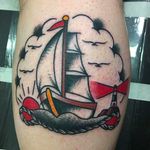 Simple yet dynamic little galleon tattoo, amazing work done by Janitor Jake. #JanitorJake #HatCityTattoo #traditional #boldtattoos #galleon #ship