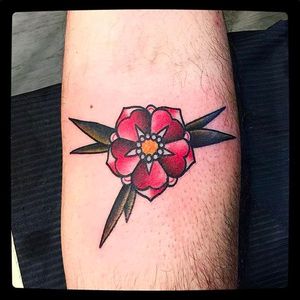 Traditional Red Blossom tattoo by @Capratattoo #Capratattoo #traditional #black #red #SkullfieldTattoo #flower #tradtionalflower #blossom