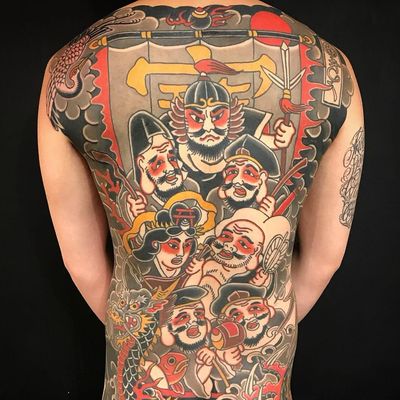 Backpiece tattoo by Kiku Punk #Kiku #kikupunk #cooltattoos #color #backpiece #Japanese #traditional #mashup #faces #portraits #banner #kanji #sword #dragon #crane #sun #koi #clouds #tattoooftheday
