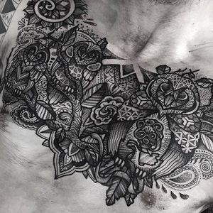 Massive chest tattoo, incredible work by Paul Davies. #pauldavies #blacktattoo #illustrativetattoo #geometrictattoo #dotstolines