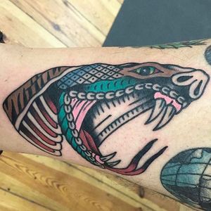 Cool traditional snake head tattoo by Tattoo Rom. #TattooRom #traditional #snake #snakehead