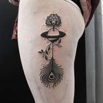 Surrealistic tattoo by Kim Tran #KimTran #illustrative #graphic #blackwork #peacockfeather #surrealistic #planet #flower
