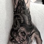 Blackwork horned-woman hand jammer tattoo by Neil Dransfield. #NeilDransfield #blackwork #neotraditional #handjammer #horned #woman #manse #manor