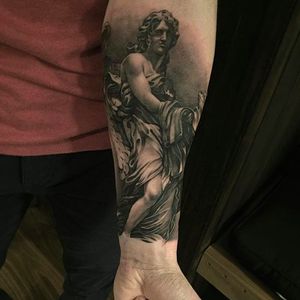 Another intense looking black and grey forearm tattoo with supreme shading technique by Ruben. #Ruben #mikstattoo #blackandgrey #forearmtattoo #angel