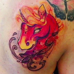 Watercolor unicorn tattoo in warm colors by Liisa Addi #watercolor #unicorn #pony #lace #watercolorunicorn #animal #LiisaAddi