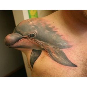 Dolphin tattoo on an amputee (via IG -- inknature) #dolphin #amputeetattoos