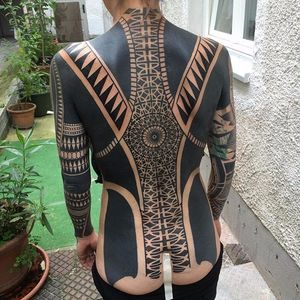 Tattoo uploaded by Tattoodo • Geometric blackwork neck and chest