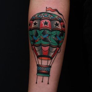 A lovely hot air balloon with lots of swallows on it by Moses D Mezoghlian (IG—moses_d_mezoghlian).