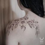 Fine line tattoo by Zihwa. #Zihwa #SouthKorean #SouthKorea #fineline #floral #blackandgrey #flower